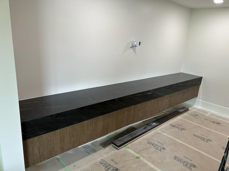 Custom porcelain bar top countertop installation in modern home